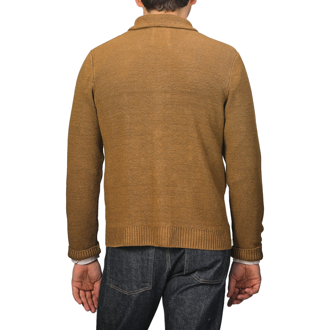 A person showcases sartorial elegance in a Tobacco Brown Linen Max 3 Chore Jacket by Max Rohr, pairing it with dark denim jeans against a neutral background.