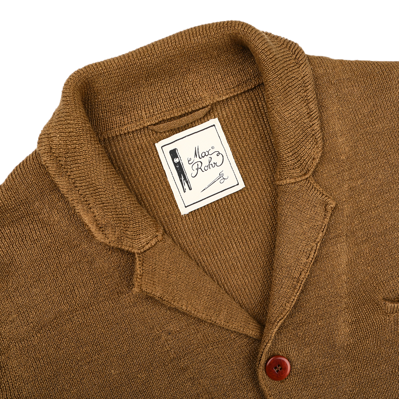 A tobacco brown linen Max 3 Chore Jacket by Max Rohr, complete with a shawl collar and a single visible button, exudes sartorial elegance.