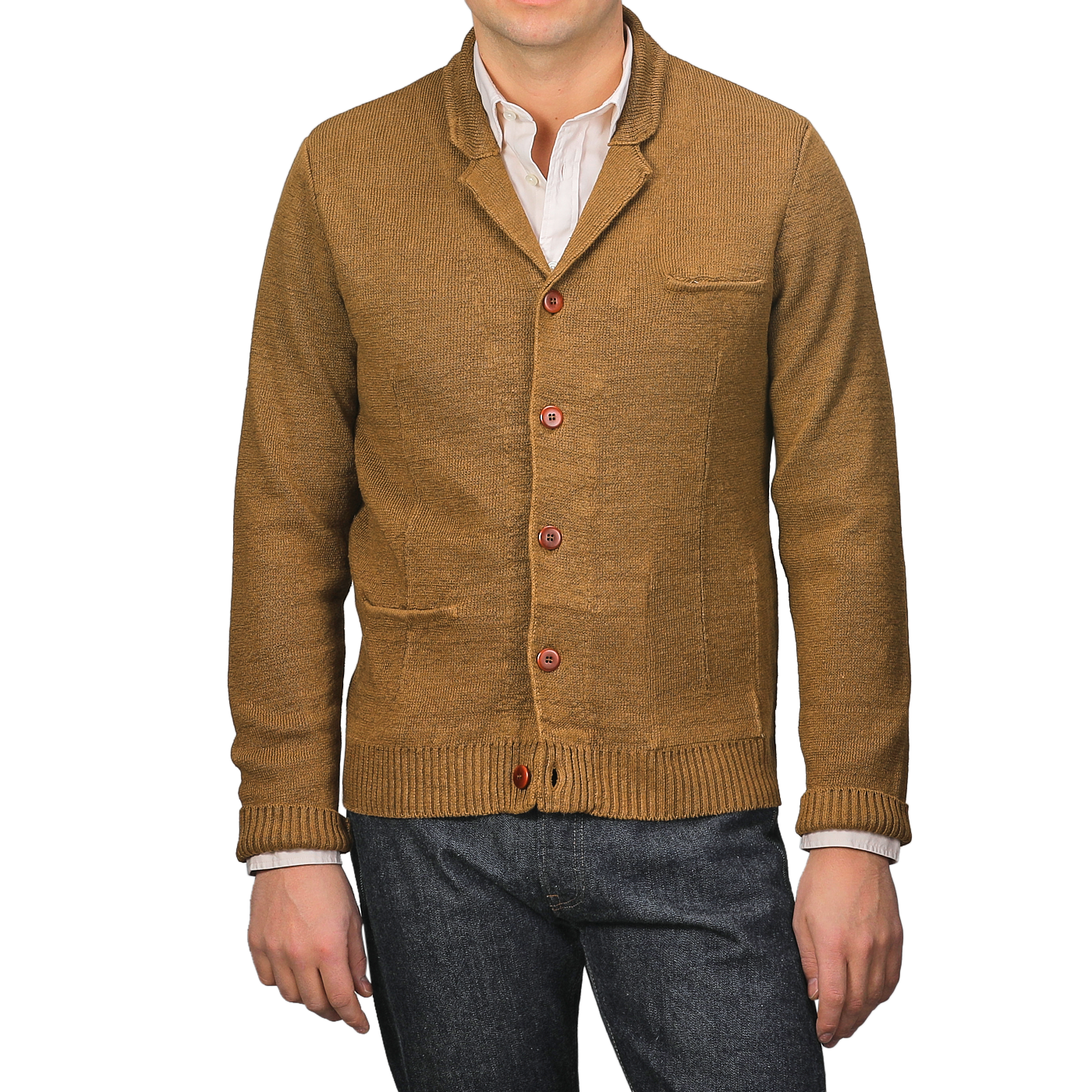 A person exudes sartorial elegance in a Tobacco Brown Linen Max 3 Chore Jacket by Max Rohr over a white shirt, perfectly paired with dark jeans.