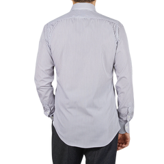 The back view of a man wearing a Mazzarelli White Grey Vintage Striped Cotton BD Slim Shirt.