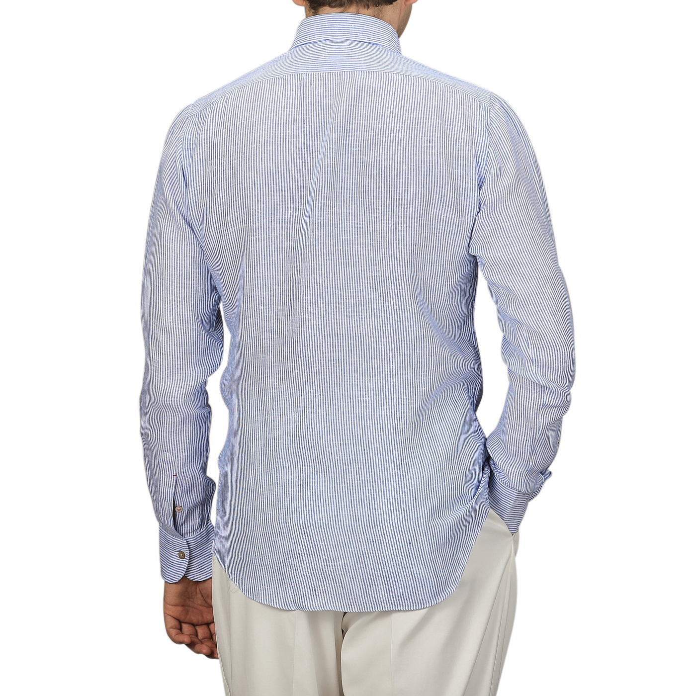 A man in a Mazzarelli Blue Striped Organic Linen BD Shirt and beige pants is seen from the back.