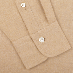 A detailed view of the sleeve on the Camel Beige Brushed Cotton Twill BD Slim Shirt by Mazzarelli, showcasing its buttoned cuff and crafted from organic cotton twill.