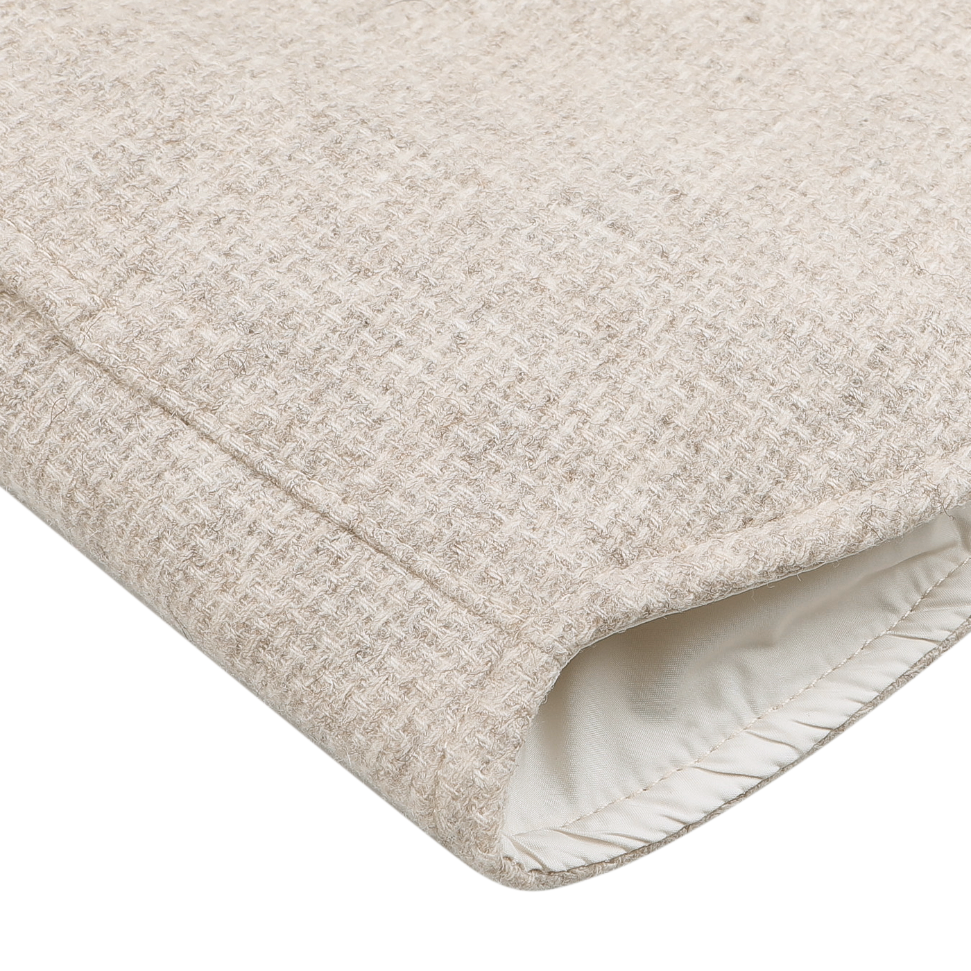 Close-up of the Mazzarelli Cream Beige Wool Cashmere Padded Overshirt with a white lining on a flat surface, perfect as a layering piece or seasonal overshirt.