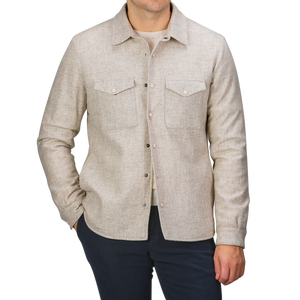 A person wearing a Cream Beige Wool Cashmere Padded Overshirt by Mazzarelli, featuring two chest pockets, stands against a neutral background. The lower part of the face is not visible.