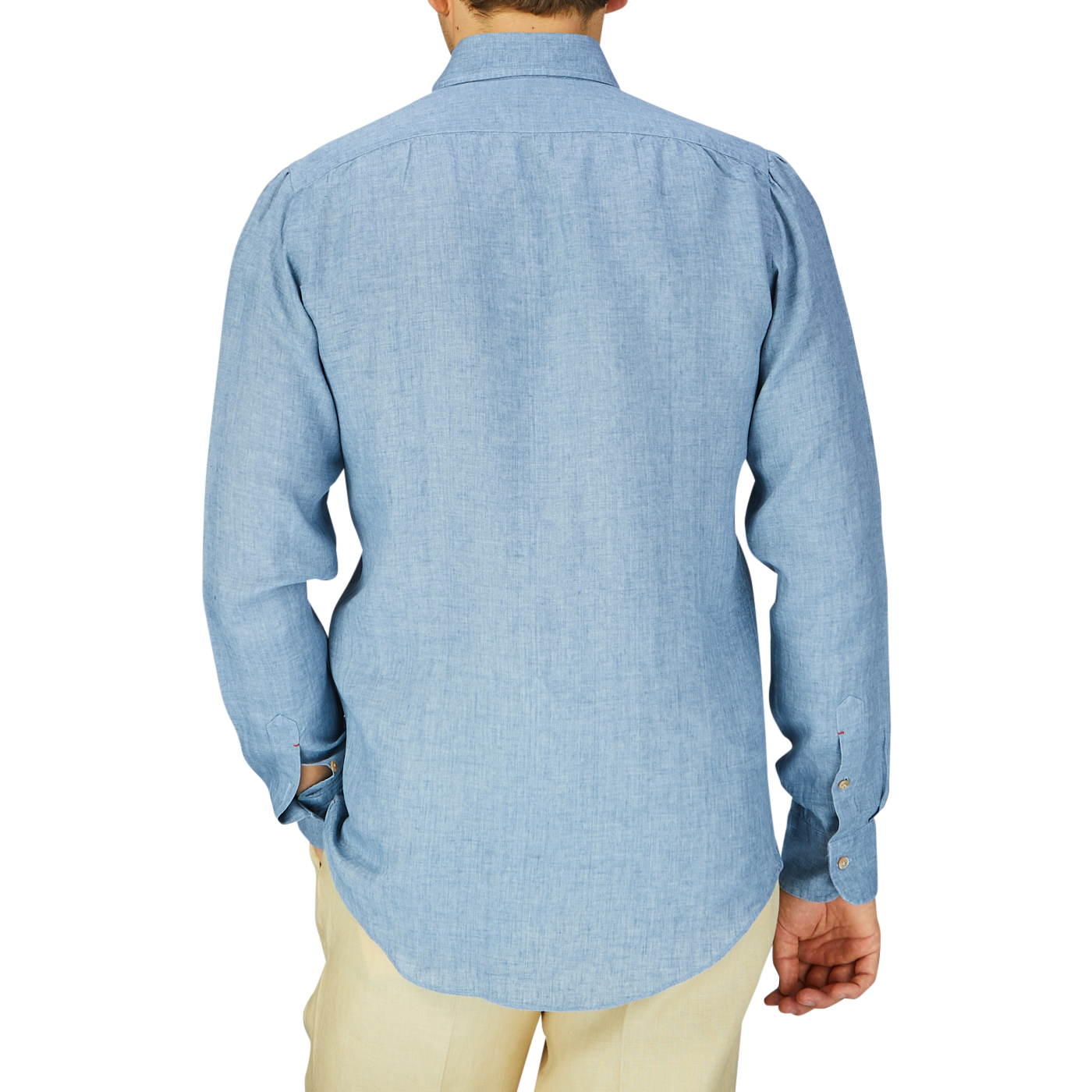 A person wearing a Denim Blue Washed Linen BD Slim Shirt by Mazzarelli viewed from the back.