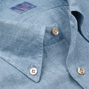 Close-up of a Denim Blue Washed Linen BD Slim Shirt collar with buttons, crafted by Italian shirtmaker Mazzarelli.