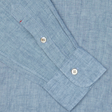 Close-up of a Denim Blue Washed Linen BD Slim Shirt cuff with buttons by Italian shirtmaker Mazzarelli.