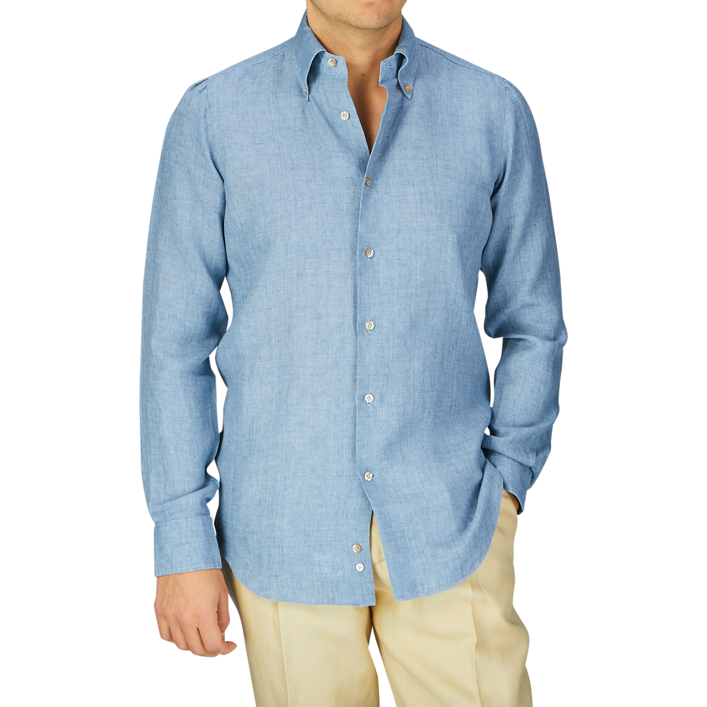 Man in a Mazzarelli Denim Blue Washed Linen BD Slim Shirt and beige pants.