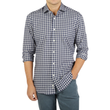 A man wearing a Mazzarelli Grey Blue Gingham Brushed Cotton Regular Shirt.