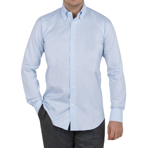 A man wearing a Mazzarelli Light Blue Royal Oxford BD Slim Shirt.