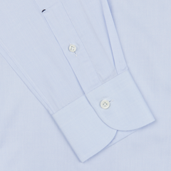 Close-up of a Mazzarelli Light Blue Slim Cutaway Herringbone Shirt with detailed view of the collar, buttons, and textured fabric.