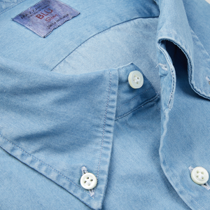 Close-up of a Light Blue Washed Denim BD Slim Shirt with buttons and a collar, crafted by Italian shirtmaker Mazzarelli from pure cotton.