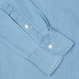 Mazzarelli Light Blue Washed Denim BD Slim Shirt cuff with buttons on a pure cotton textile background.