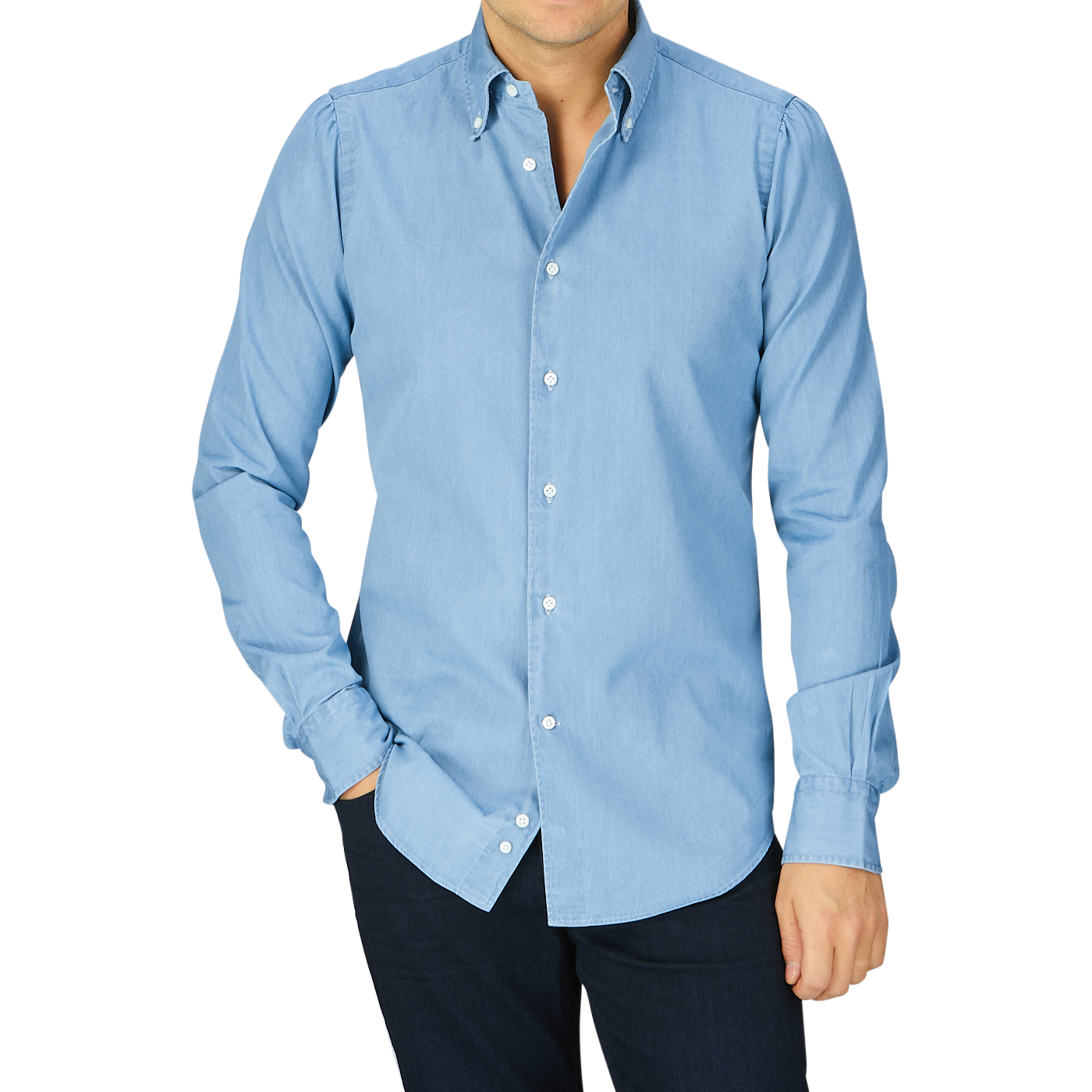 A man wearing a Mazzarelli Light Blue Washed Denim BD Slim Shirt and dark pants against a grey background.