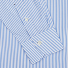 Close-up of a Mazzarelli Light Blue White Striped Cotton BD Slim Shirt showing detail of the cuff with buttons.