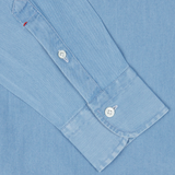 Close-up of a Light Denim Washed Cotton BD Regular Fit Shirt cuff with white buttons by Italian shirtmaker Mazzarelli.