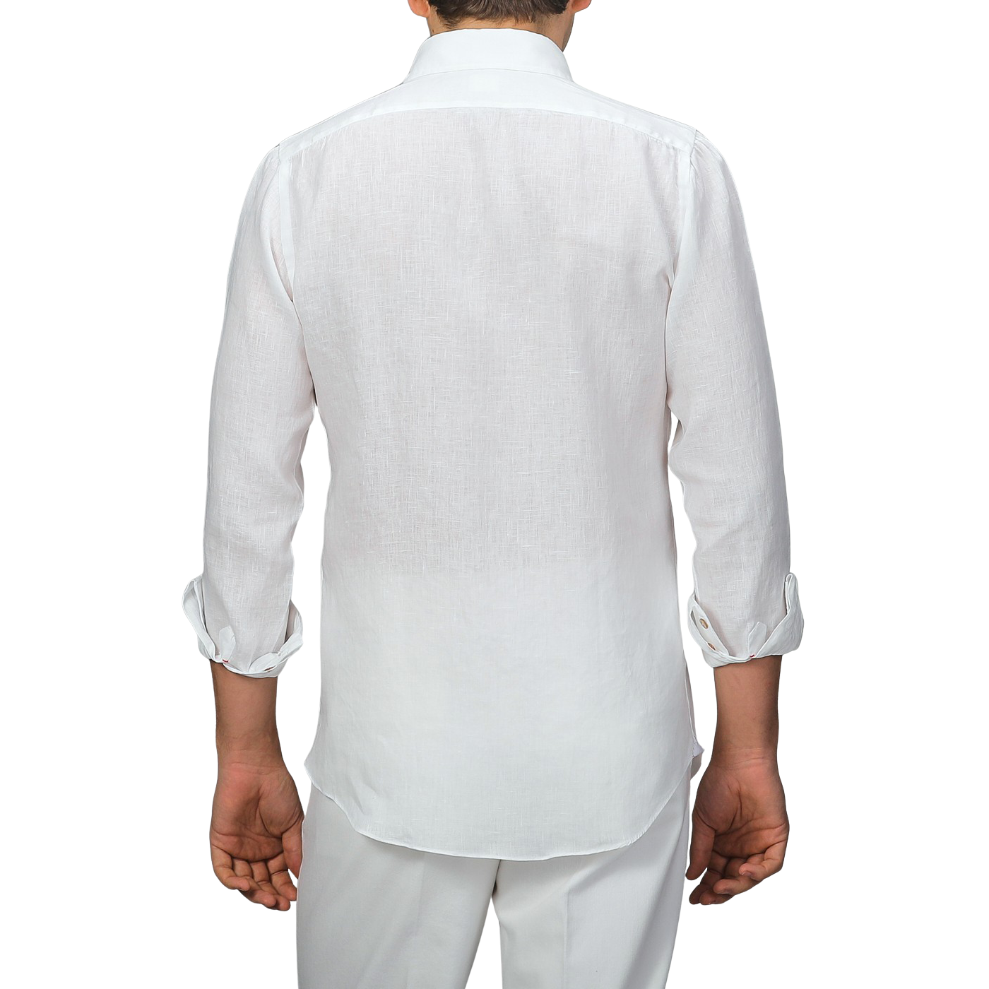 A person is seen from behind wearing an Off-White Organic Linen BD Shirt by Mazzarelli, featuring rolled sleeves and a button-down collar, paired with white pants.