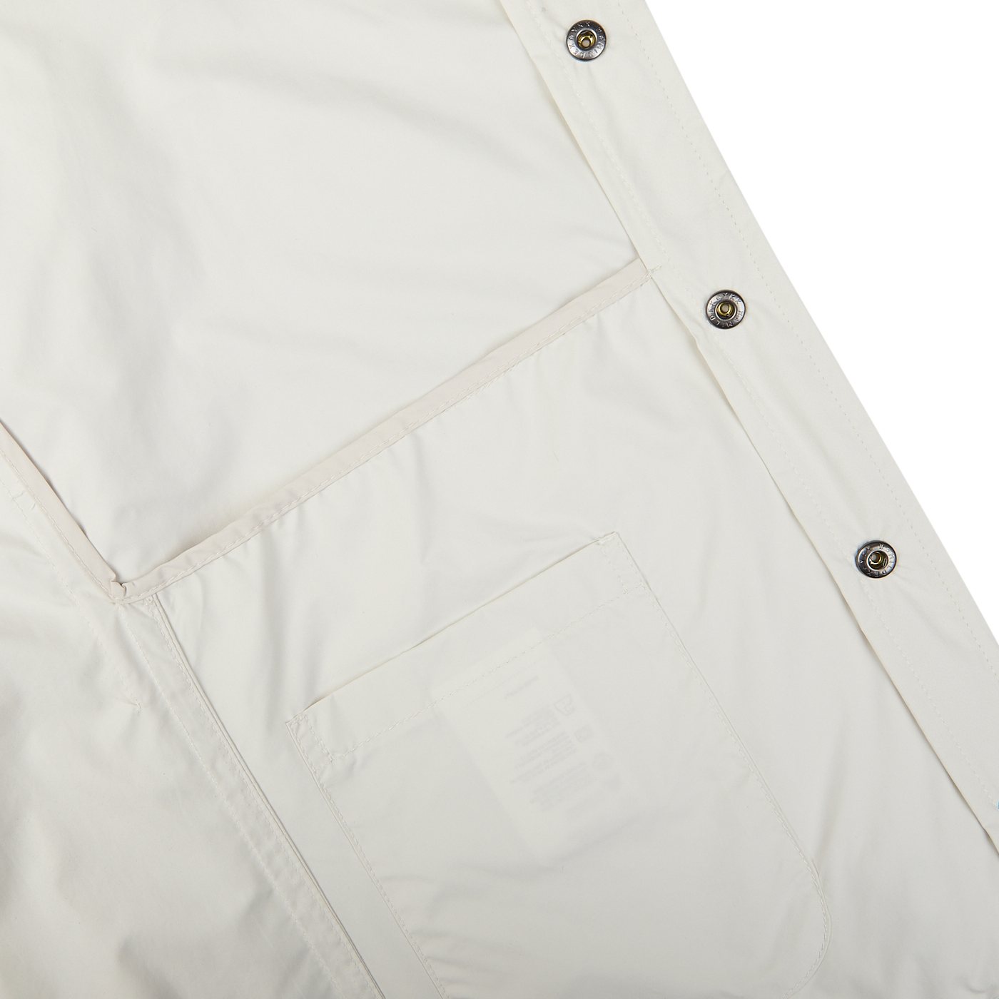 Water-resistant Off-White nylon fabric with snap buttons and a transparent pocket detail by Mazzarelli.