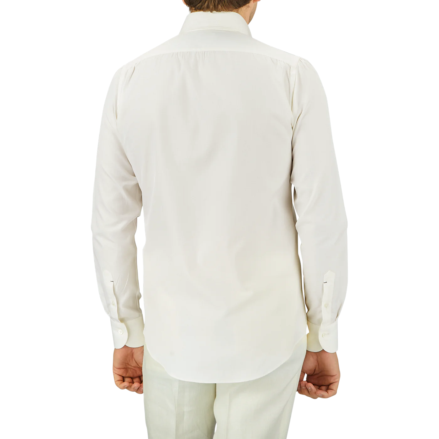 Back view of a person wearing an Off White Cotton Twill BD Slim Shirt by Mazzarelli and light-colored pants.