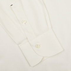 A detailed view of the sleeve from the Mazzarelli Off White Cotton Twill BD Slim Shirt, showcasing buttoned cuffs against a plain background, crafted from pure cotton twill.