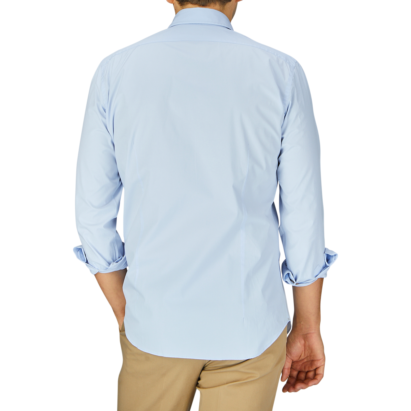 A man seen from behind wearing a Sky Blue Cotton Gabardine Regular Fit Shirt by Mazzarelli and beige pants.