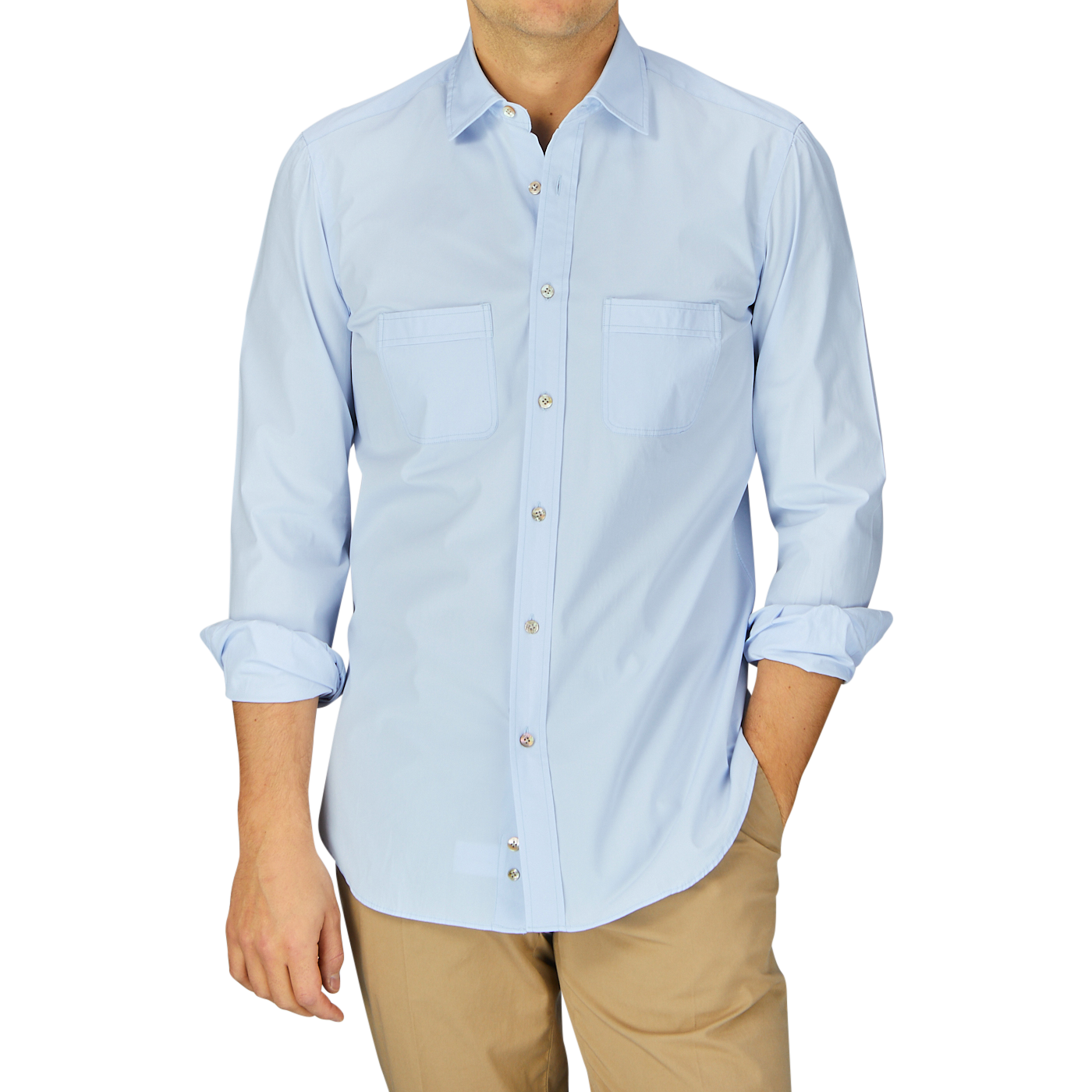 Man wearing a stone-washed, Sky Blue Cotton Gabardine Regular Fit shirt from Mazzarelli and khaki pants.