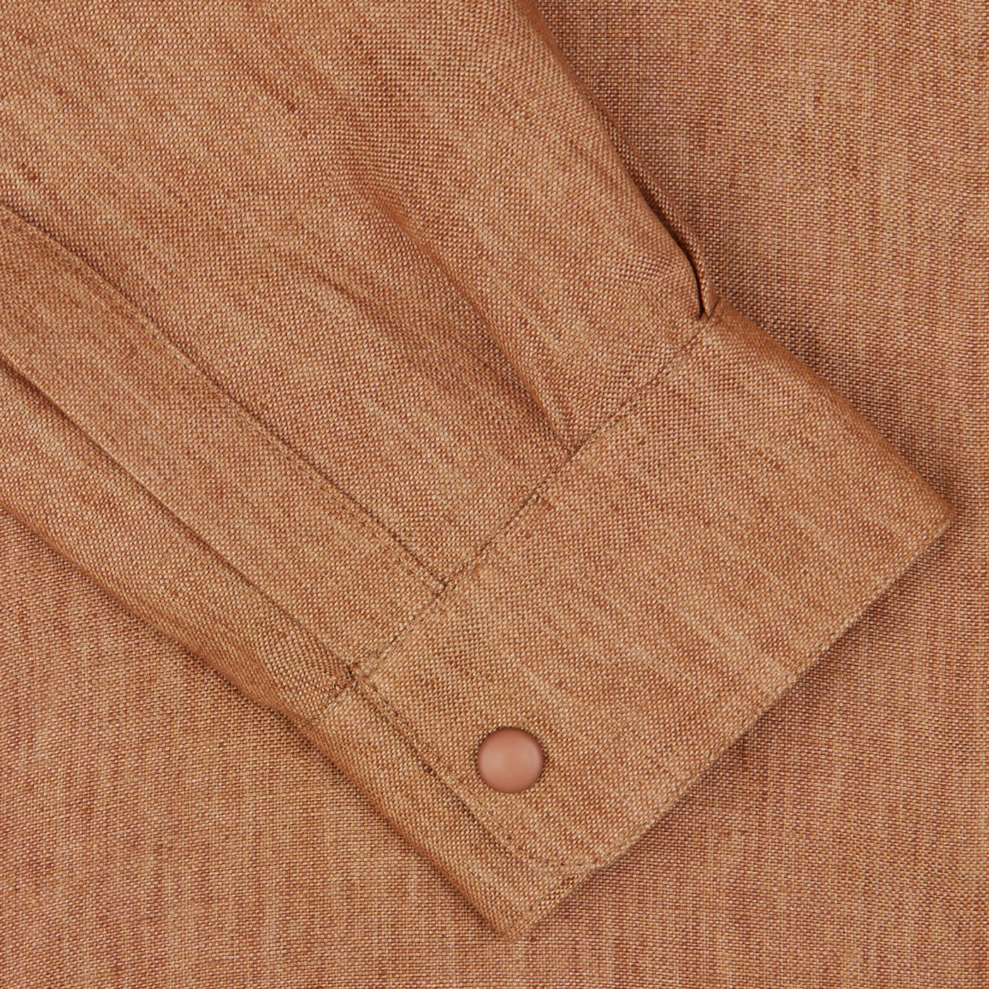 Close-up of a Terracotta Brown Organic Linen Overshirt by Mazzarelli with a buttoned cuff.