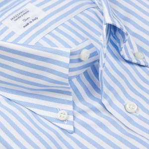Close-up of a Mazzarelli White Blue Bengal Striped BD Slim Shirt with a label indicating the brand and "made in Italy.