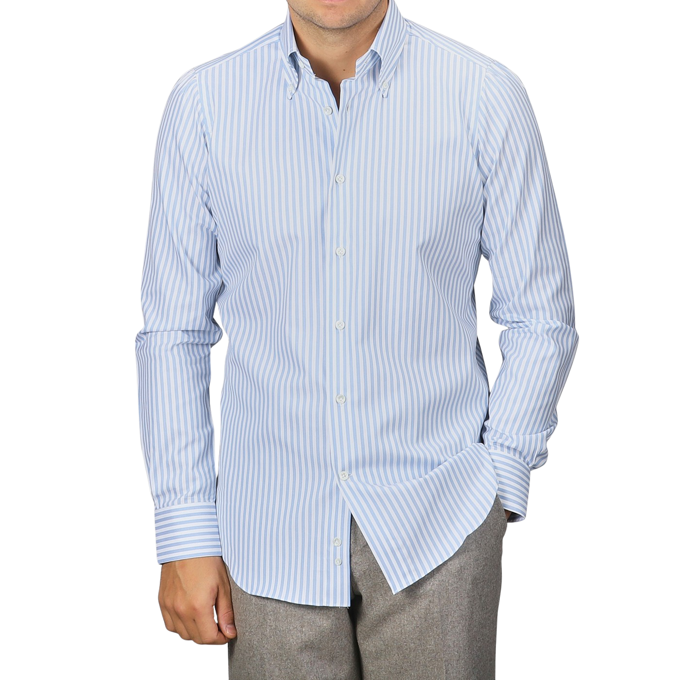 A man wearing a Mazzarelli White Blue Bengal Striped BD Slim Shirt and gray pants stands against a plain background.