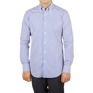 A slim man wearing a Mazzarelli White Blue Striped Cotton BD Slim Shirt.