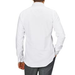 A person wearing the Mazzarelli White Brushed Cotton Twill BD Slim Shirt and gray pants is shown from behind against a neutral background.