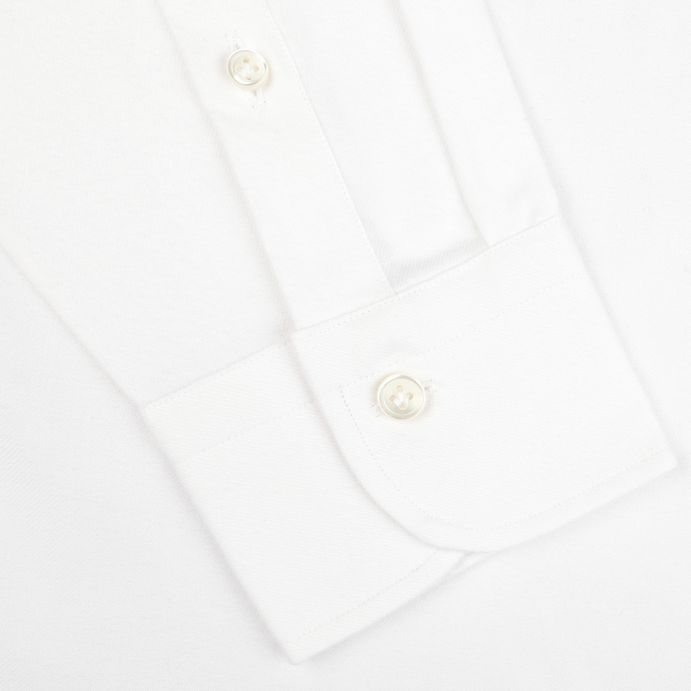 Close-up of the cuff on the Mazzarelli White Brushed Cotton Twill BD Slim Shirt, showcasing two buttons and smooth, textured cotton twill fabric.