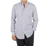 Mazzarelli, an Italian shirtmaker, creates a stylish White Grey Vintage Striped Cotton BD Slim Shirt for a man.