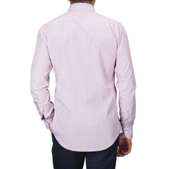 An individual is observed from the back, dressed in a "White Red Vintage Striped Cotton BD Slim Shirt" by Mazzarelli, showcasing a soft button-down collar in light pink.