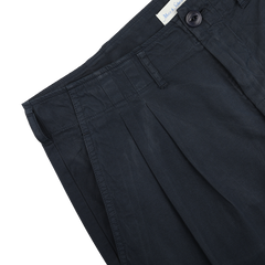 Navy Blue Cotton Poplin 03 Pants by Merz b. Schwanen feature a buttoned waistband and belt loops, offering versatile and comfortable style against a plain backdrop.