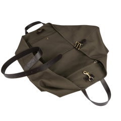 The Army Dark Brown M/S Haven Weekend Bag by Mismo boasts an olive green canvas exterior, dark brown leather handles and accents, brass hardware, a front pocket, and an adjustable strap.