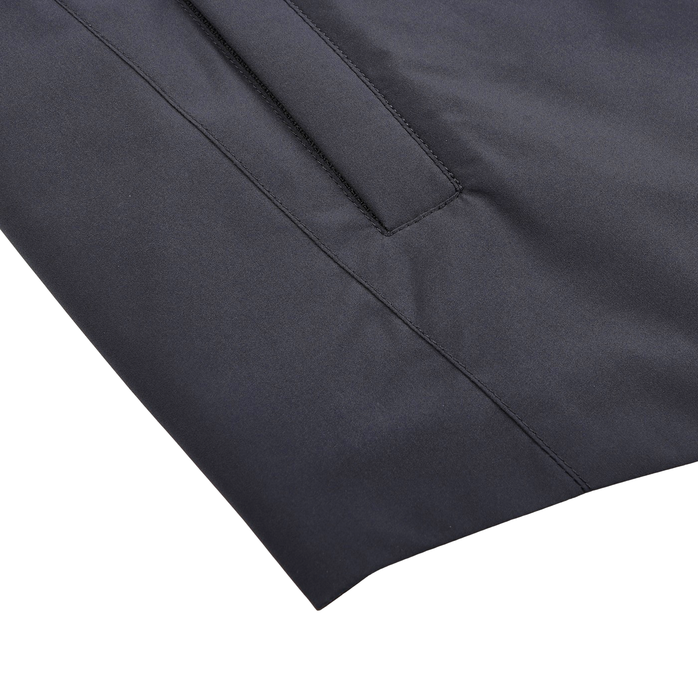 Close-up of a Montecore Dark Blue Light Down Waterproof Shirt Jacket sleeve, featuring a straight seam and angled pocket detail, epitomizing contemporary outerwear against a white background.