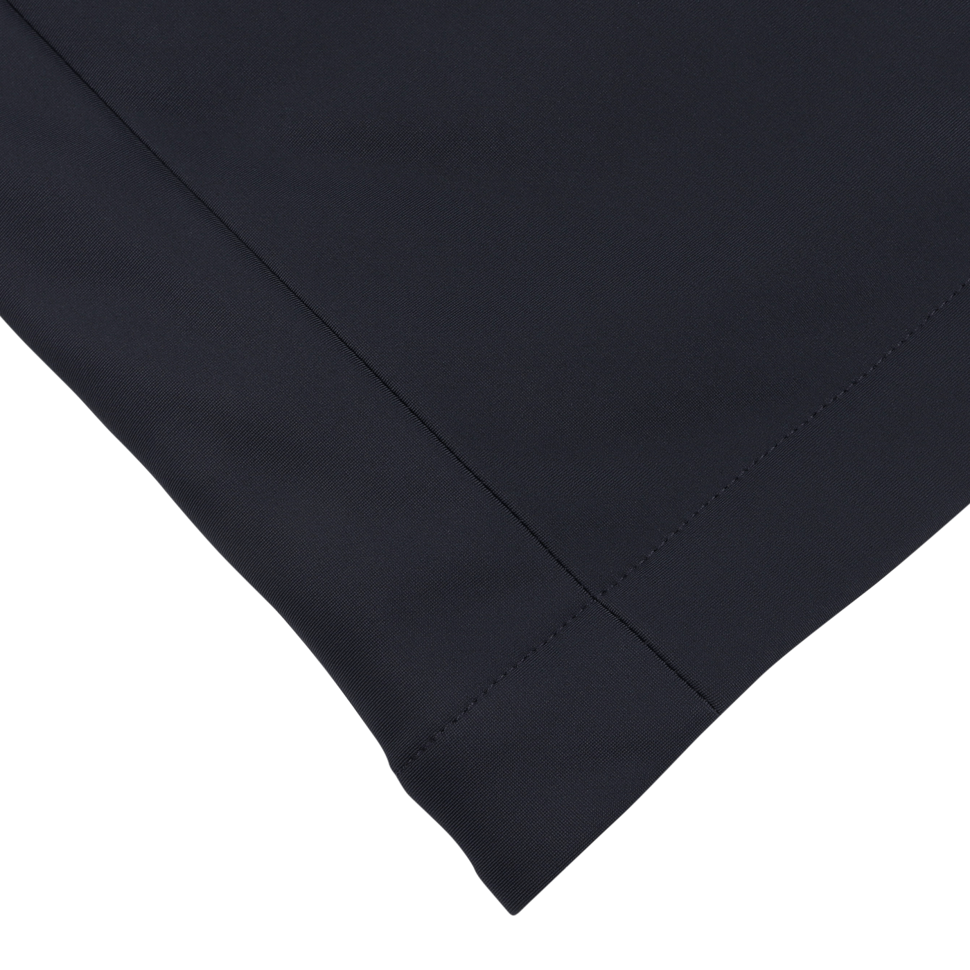 Close-up of the Navy Blue Nylon Technical outer fabric with a seam running horizontally and vertically, creating a corner. The precise stitching is visible, emphasizing the clean and smooth texture typically found in Montecore's padded car coats.