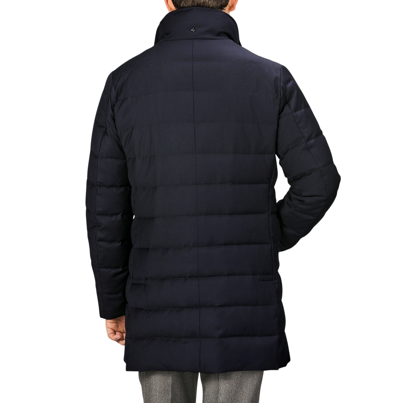 A person wearing a long, navy blue Montecore Super 120s Wool Batavia Padded Coat with a high collar, viewed from the back. The Italian outerwear features horizontal stitching and extends below the hips.