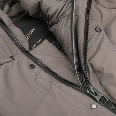 Close-up of a Montecore Taupe Beige Nylon Down Padded Parka with a zipper partially open, revealing the inside lining and label. Two snap buttons are visible on the placket.