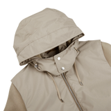 A Moorer beige weather-resistant jacket with a hood.