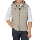 A man wearing a Moorer Beige Down Padded Knitted Sleeve Bomber.