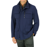 A man wearing the Moorer Dark Blue Lightweight Nylon Field Jacket.