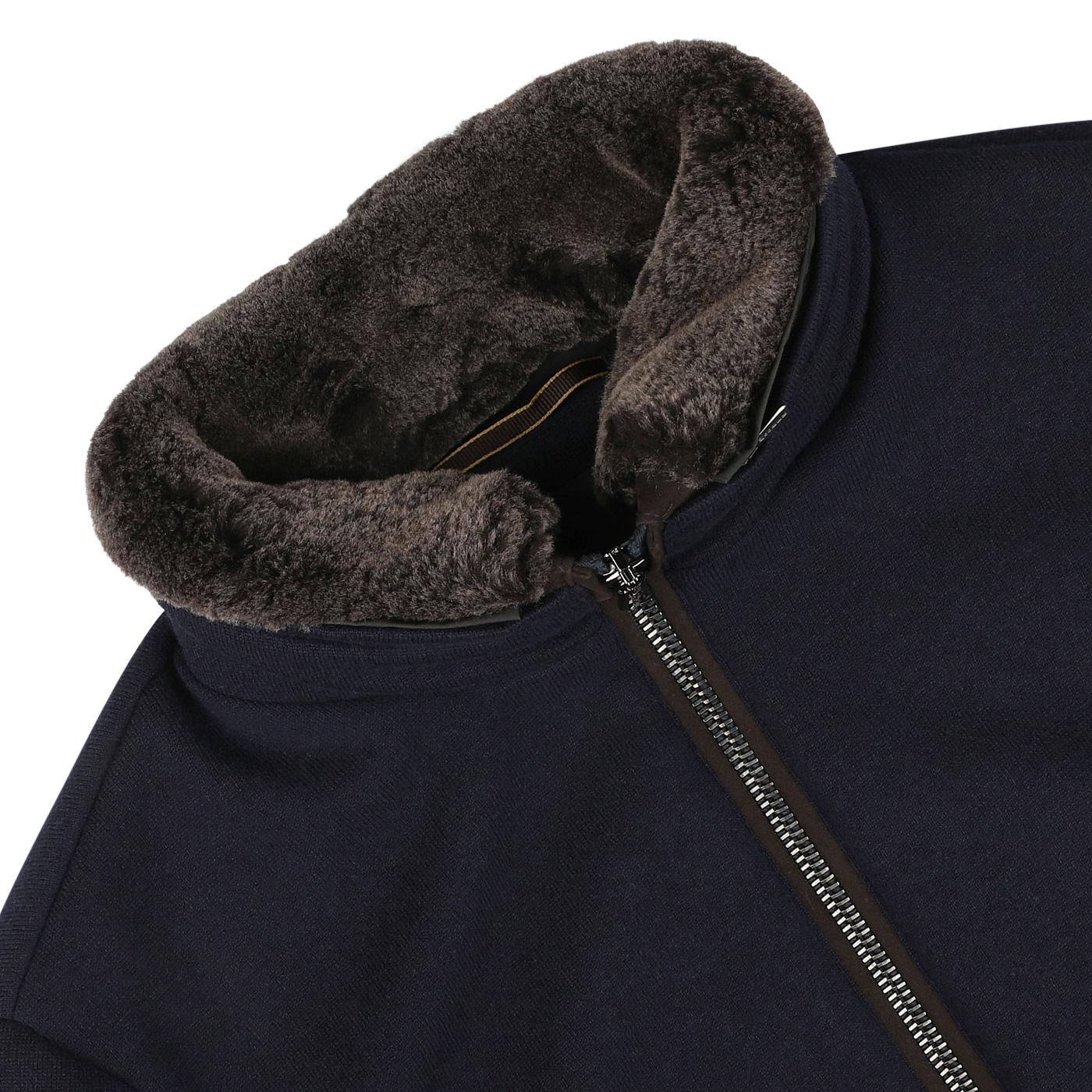 Close-up of the Navy Blue Cashmere Blend Down Padded Blouson by Moorer, featuring a front zipper and a thick, brown faux fur lining on the collar, laid flat on a white surface. This piece of Italian outerwear combines style and warmth effortlessly.