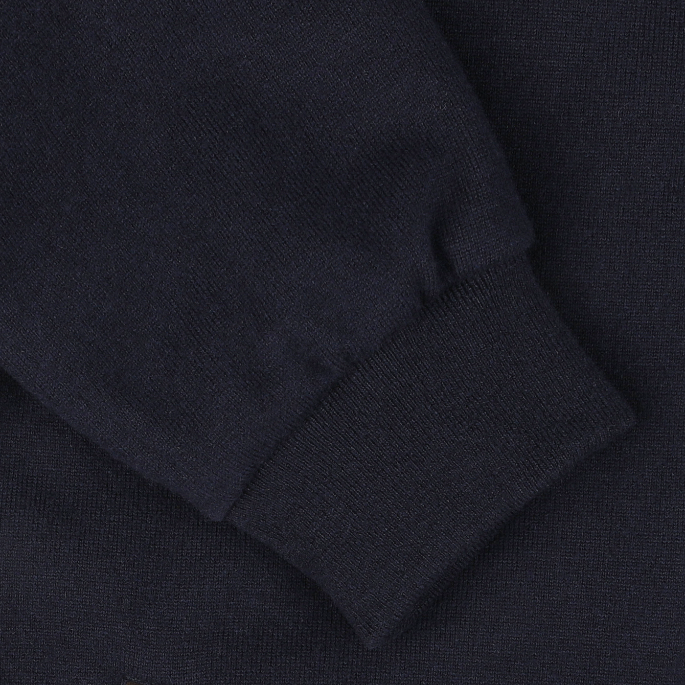 Close-up of a navy blue Moorer cashmere blend down padded blouson featuring a cuffed sleeve.