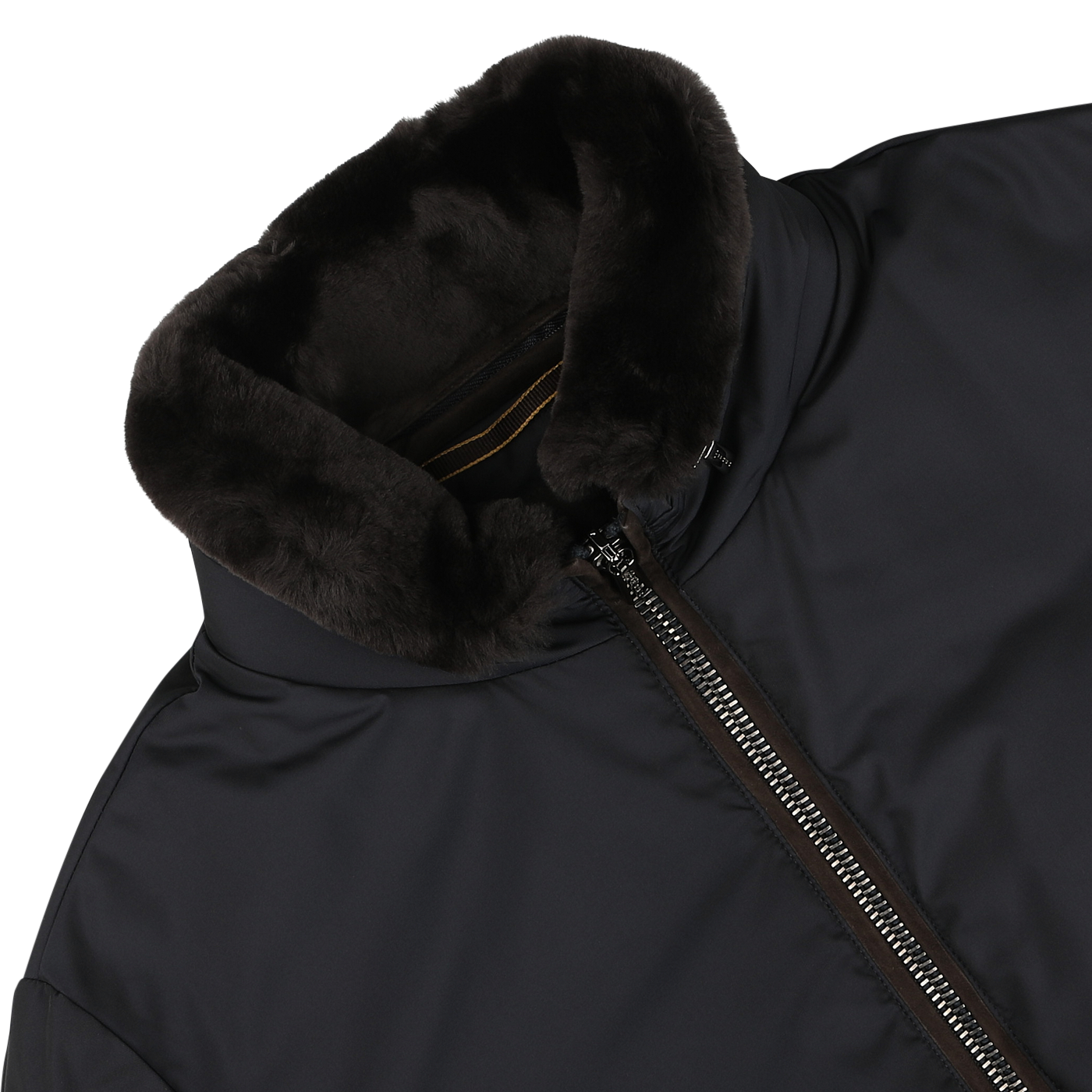 Close-up of the Navy Blue Nylon Down Padded Blouson by Moorer, showcasing a full-length zipper and a soft, black fur-lined collar, crafted from technical nylon.