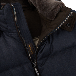 A weather-resistant, Moorer Navy Blue Nylon Down Padded Quilted Jacket with a fur lining.