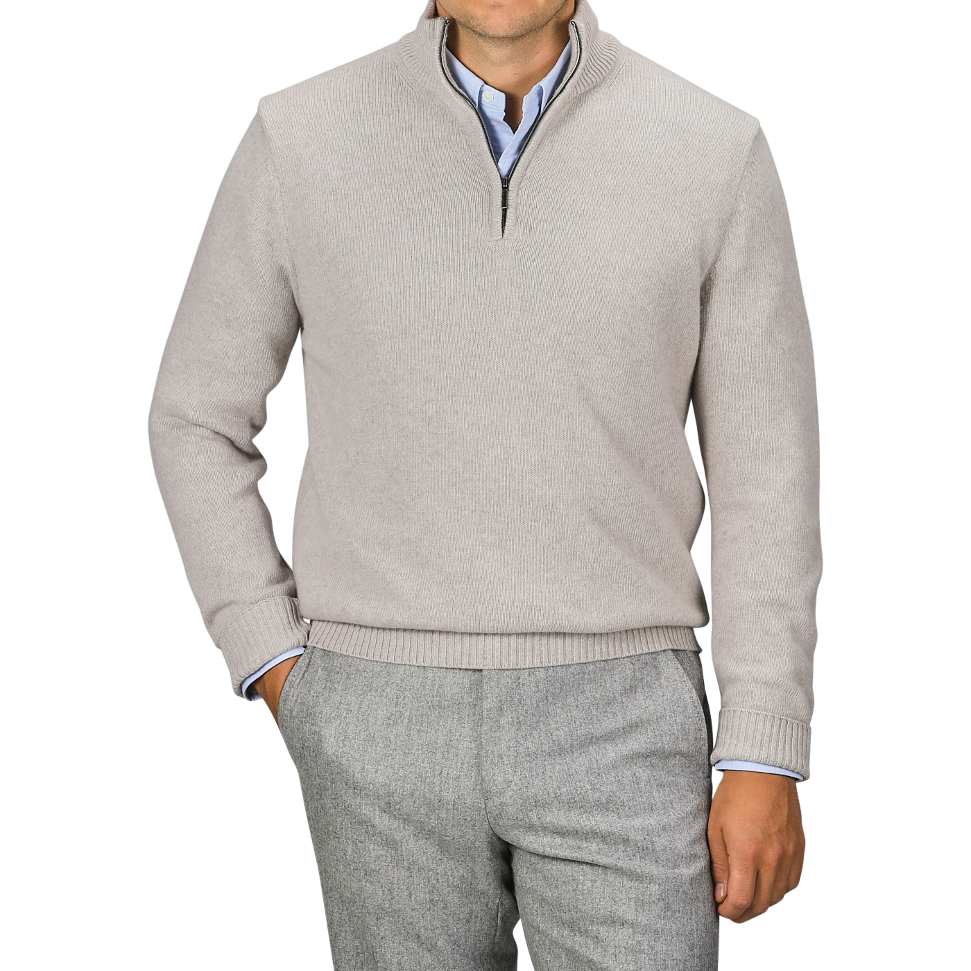 Man wearing a Taupe Beige Wool Cashmere Quarter Zip sweater by Morgano over a blue collared shirt, paired with gray trousers, standing against a neutral background.