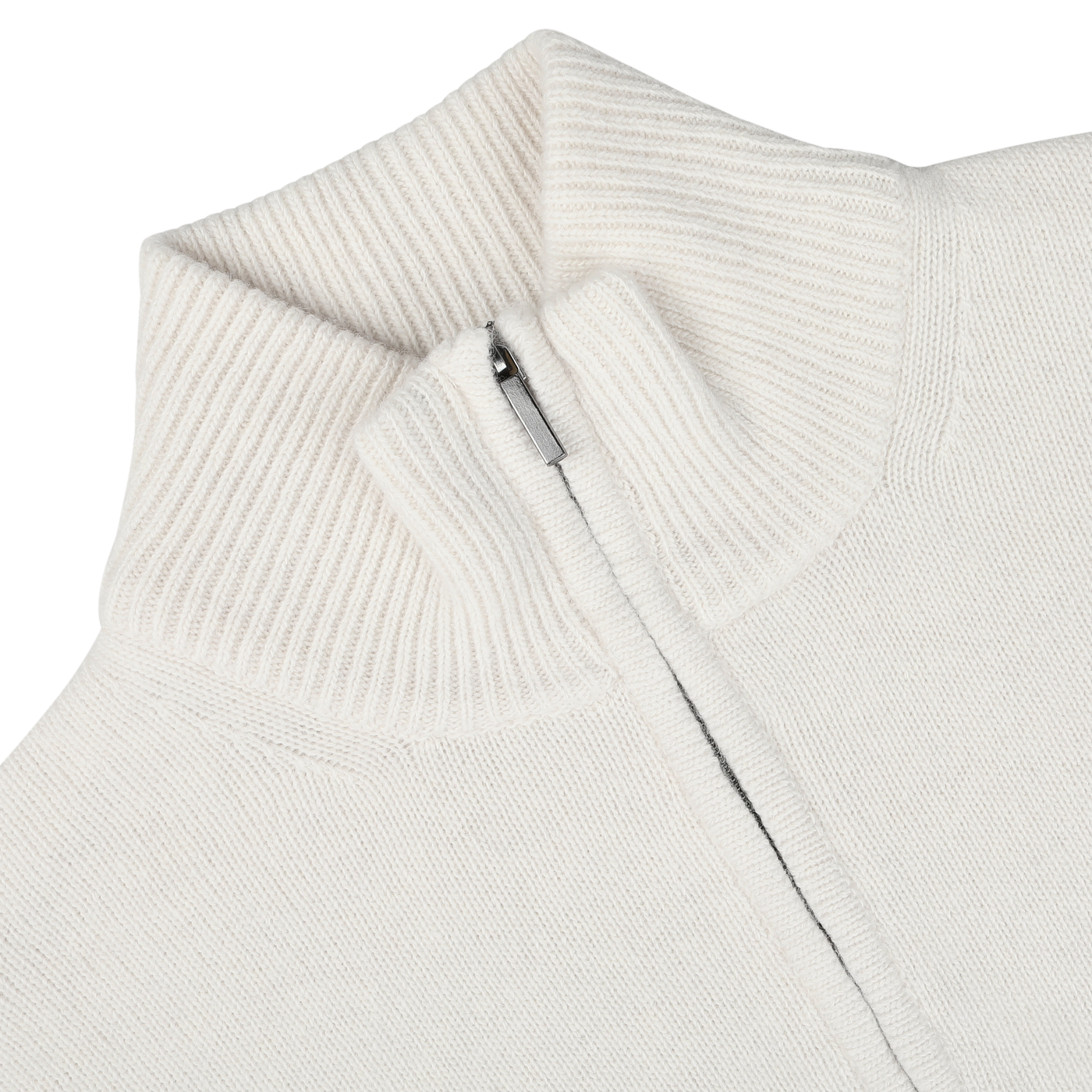 Close-up of the Morgano Cream Wool Cashmere Quarter Zip sweater, featuring a ribbed mock neck collar. The zipper is partially open, revealing a neatly stitched interior. The soft fabric hints at the luxury of its wool and cashmere blend.