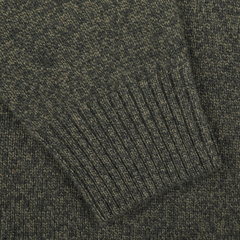 Close-up of the ribbed cuff on the Green Melange Heavy Wool Cashmere Rollneck by Morgano.